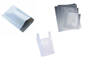 An Open White Poly Mailer, A Stack Of Transparent LDPE Plastic Bags, And A Biodegradable Plastic Bag
